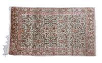 A Turkish Prayer Rug 3 feet 10 1/2 inches x 2 feet 4 1/2 inches.
