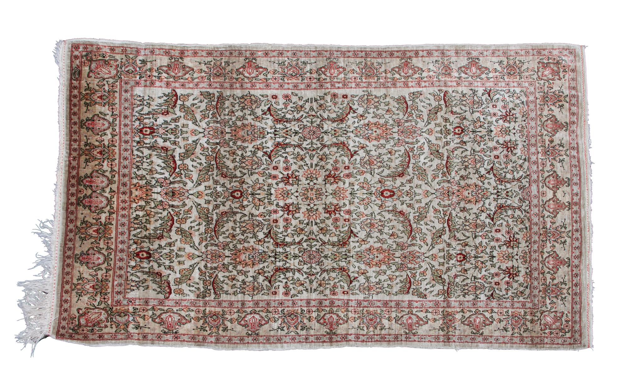 A Turkish Prayer Rug 3 feet 10 1/2 inches x 2 feet 4 1/2 inches.