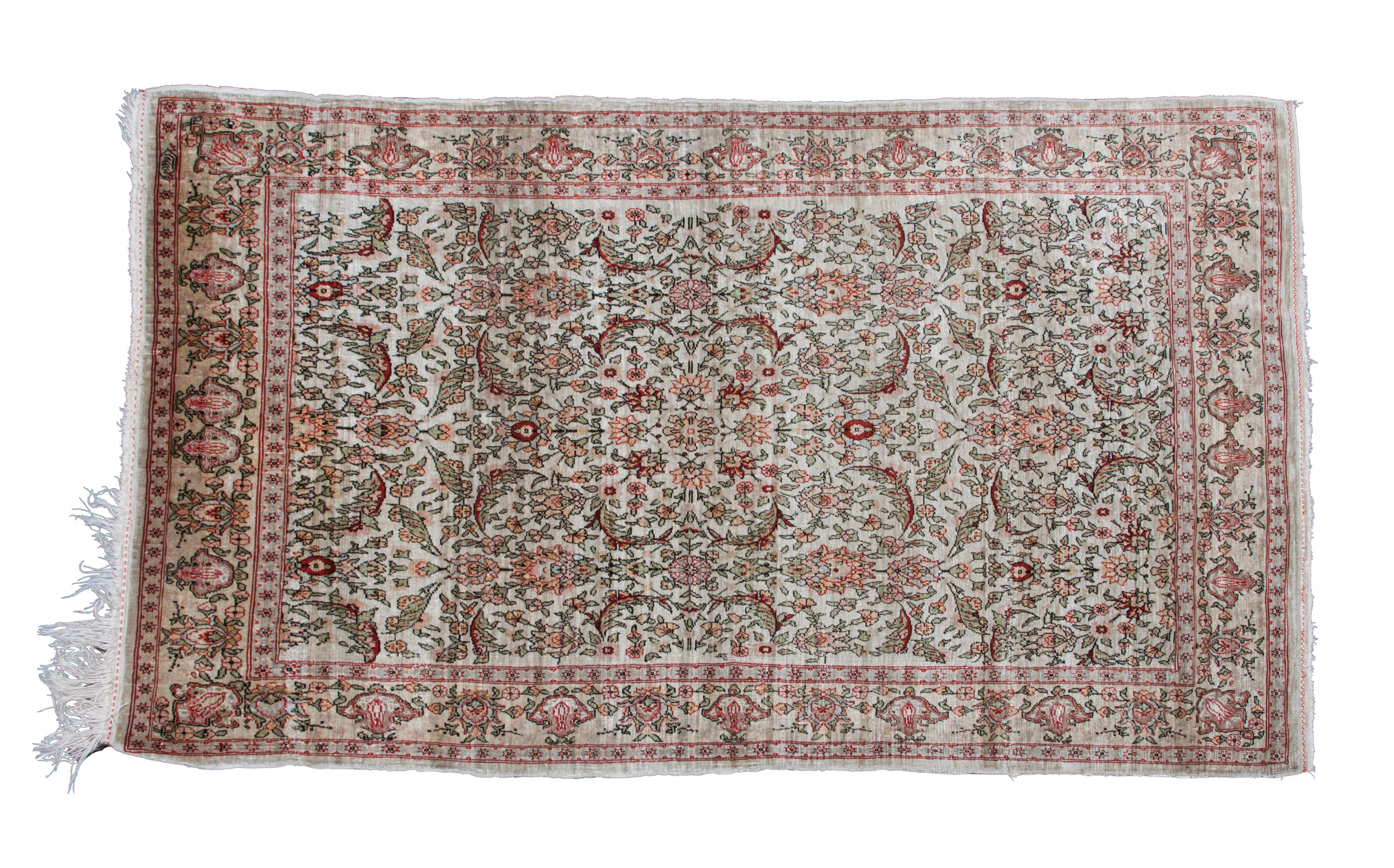 A Turkish Prayer Rug 3 feet 10 1/2 inches x 2 feet 4 1/2 inches.