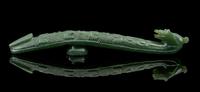 A Spinach Jade Belt Hook Length 4 1/2 inches.