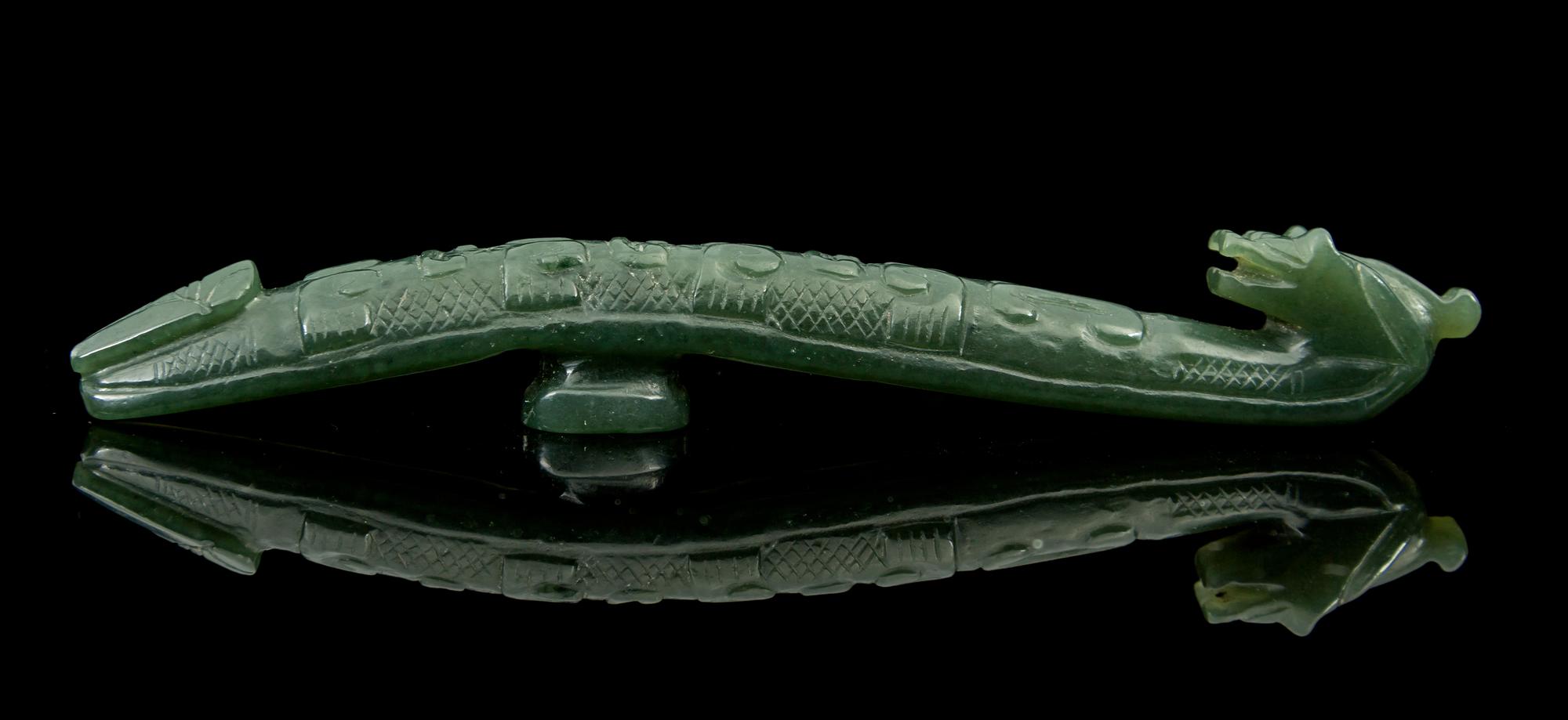 A Spinach Jade Belt Hook Length 4 1/2 inches.