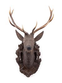 A Black Forest Carved Stag Head
