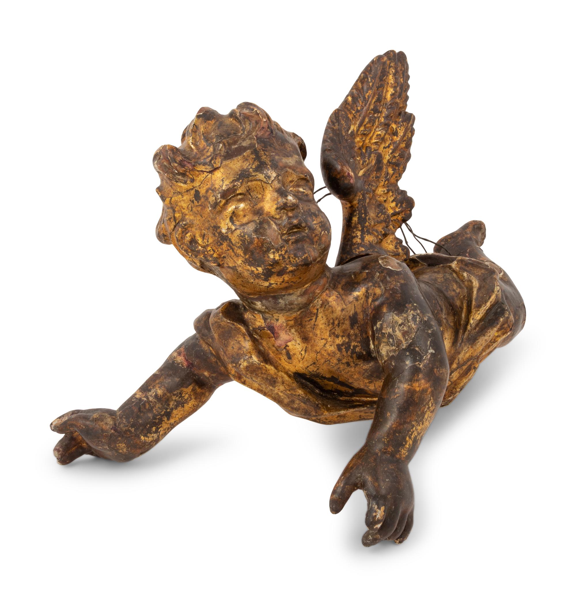 An Italian Giltwood Cherub Figure