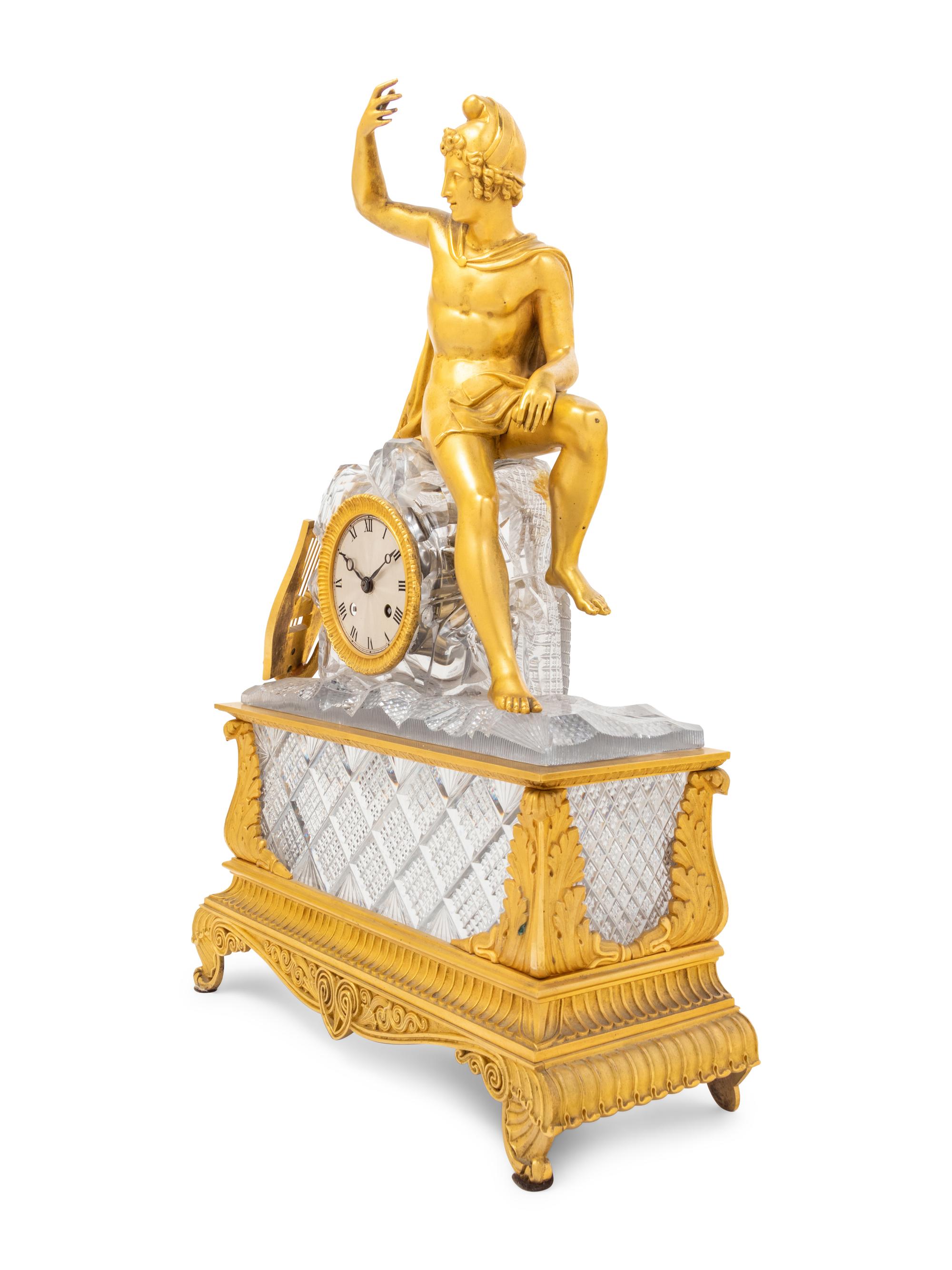 An Empire Style Gilt Bronze and Cut Glass Figural Mantel Clock