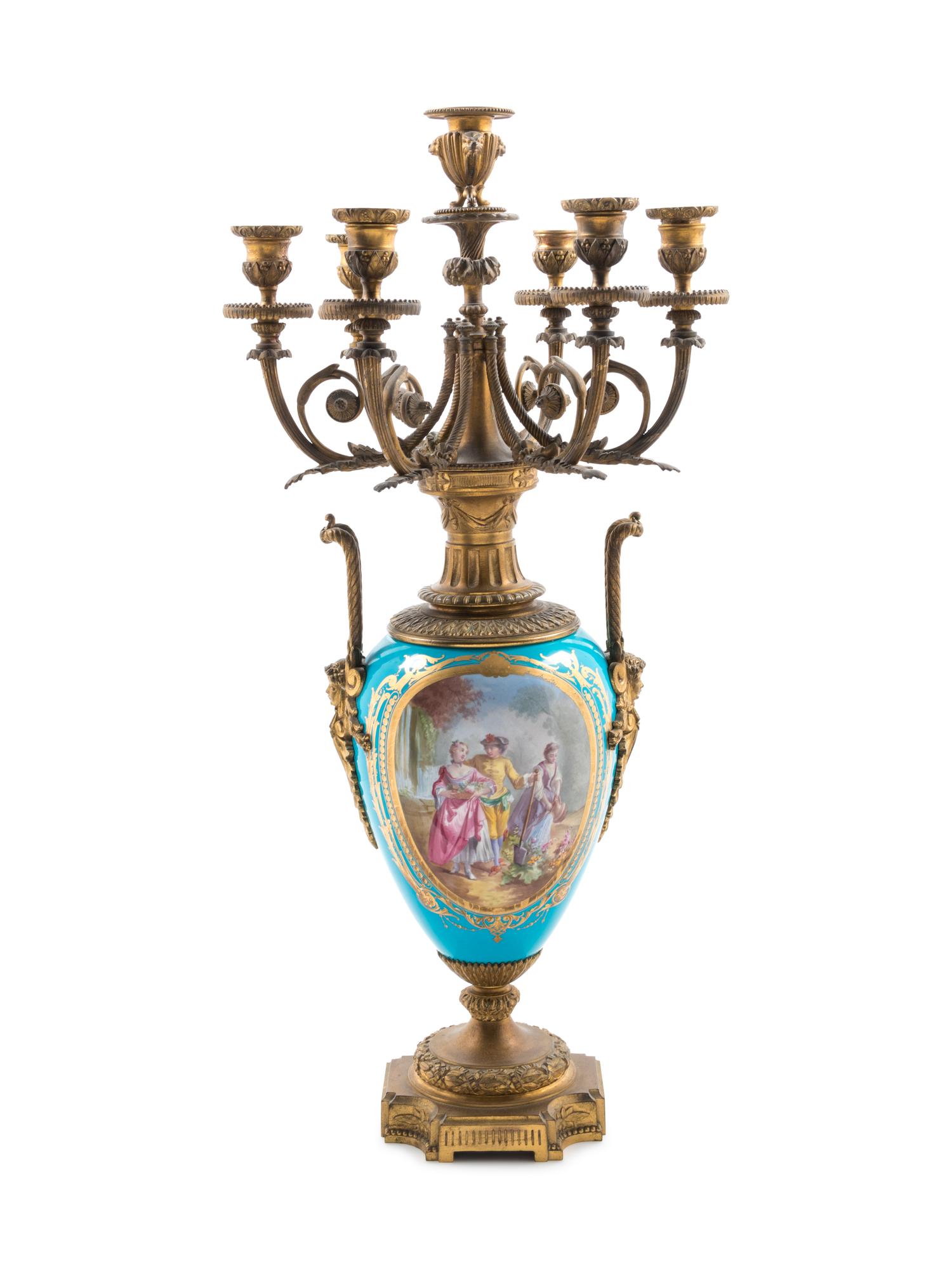 A Sèvres Style Gilt Bronze Mounted Painted and Parcel Gilt Celeste-Blue Ground Porcelain Seven-Light Candelabrum