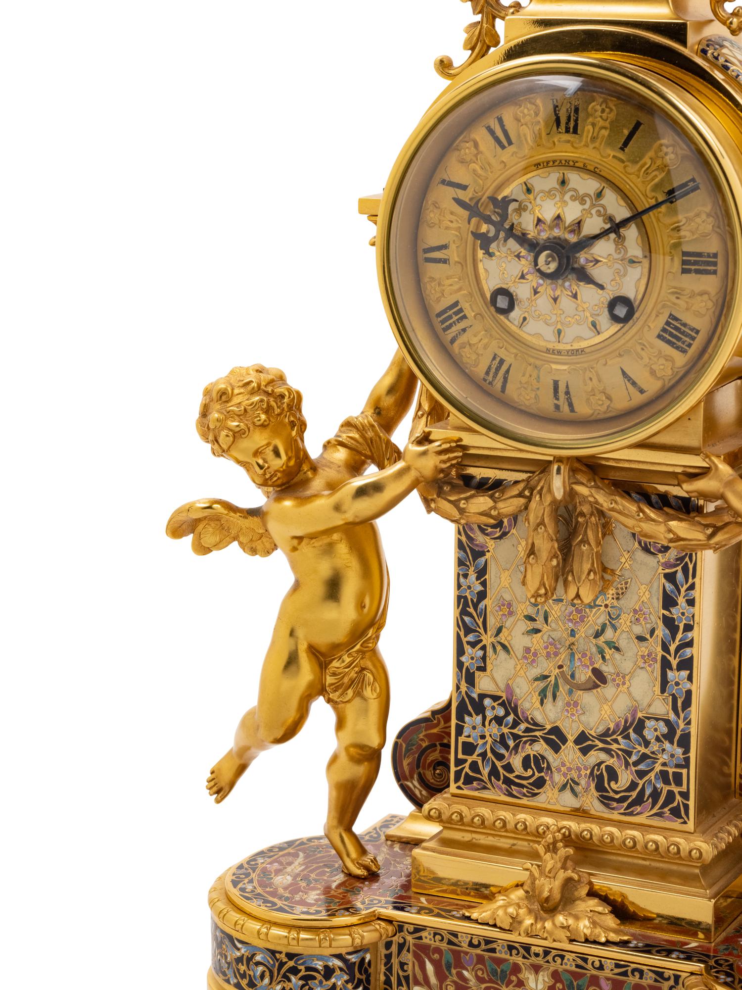 A French Gilt Bronze and Champlevé Clock Garniture Retailed by Tiffany and Co.