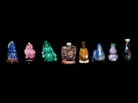 Eight Chinese Precious Stone and Lacquered Snuff Bottles