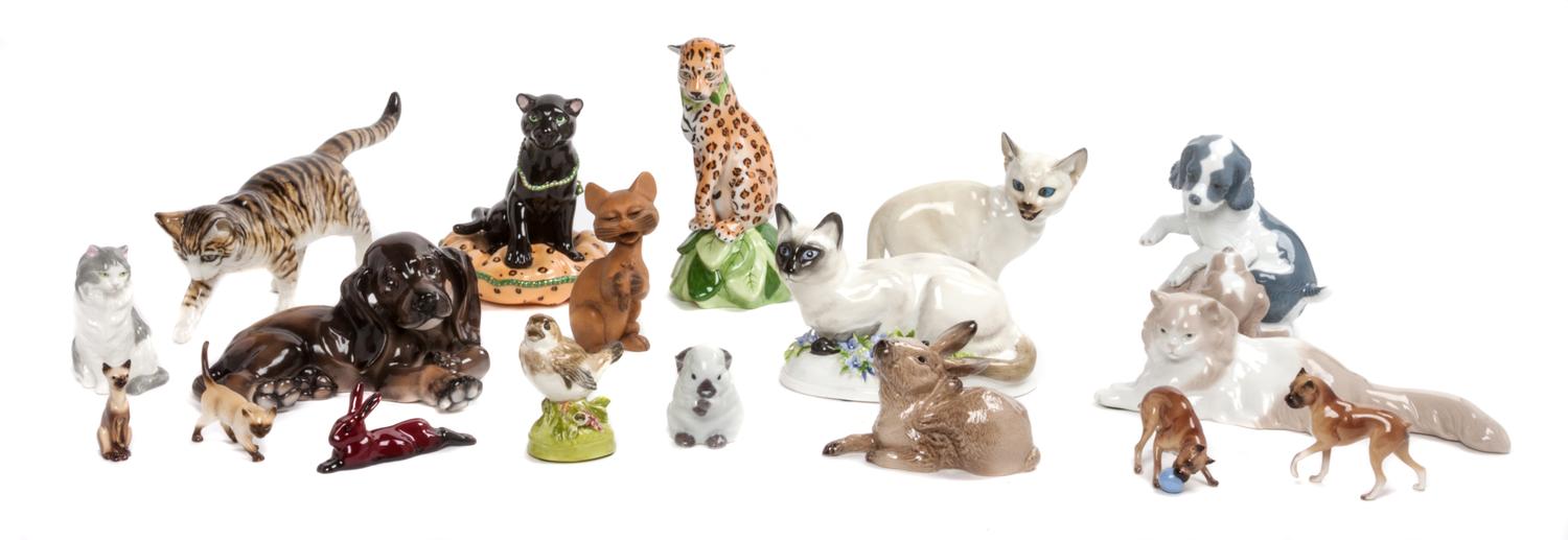 Eighteen Assorted Porcelain, Wood and Composite Figures Width of widest 12 inches. — 20TH AND 21ST CENTURY
