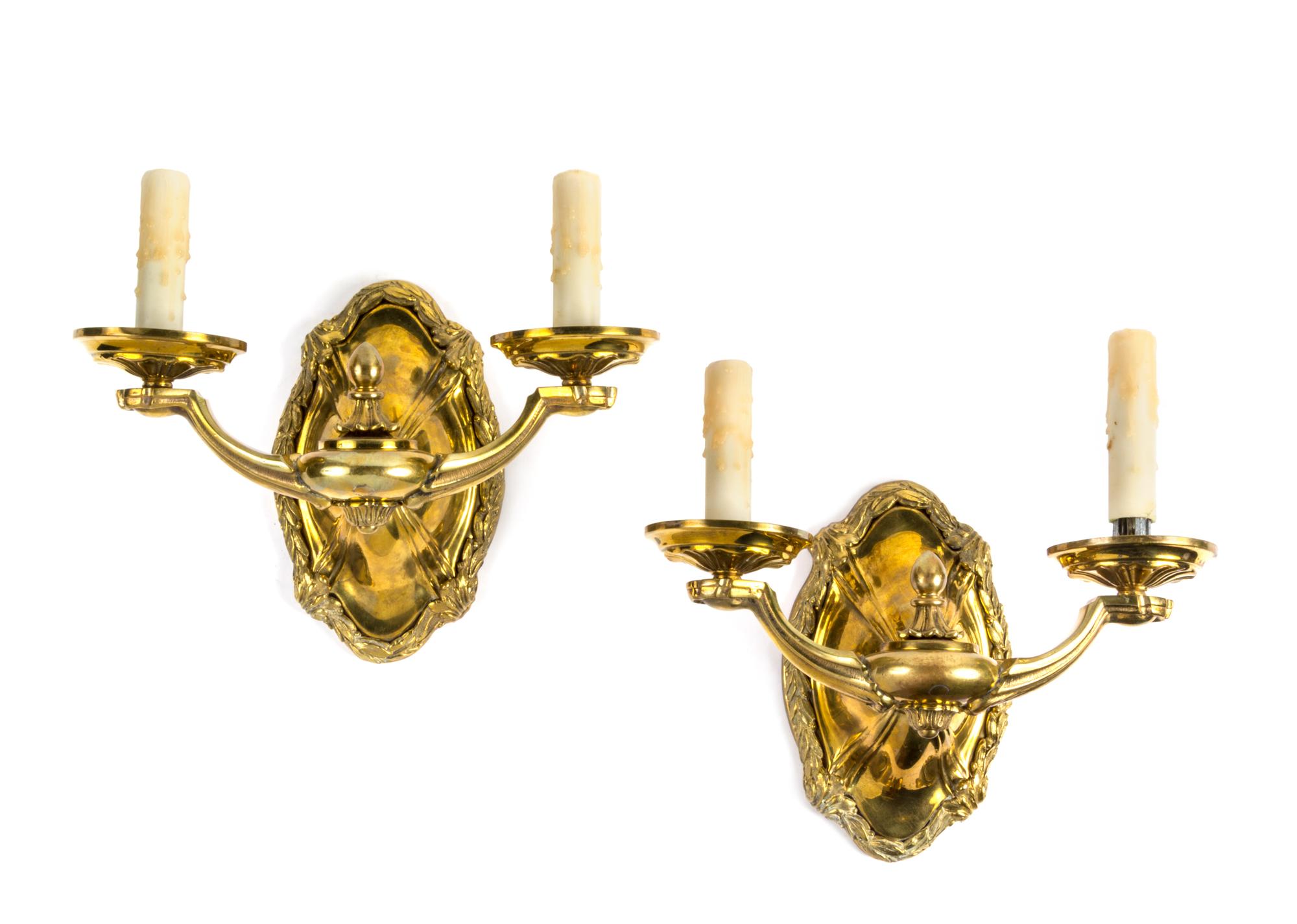 A Pair of Two-Light Gilt Metal Sconces Width 11 3/4 inches.