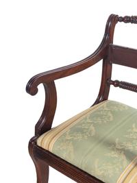 A Pair of Regency Twist-Carved Mahogany Armchairs
