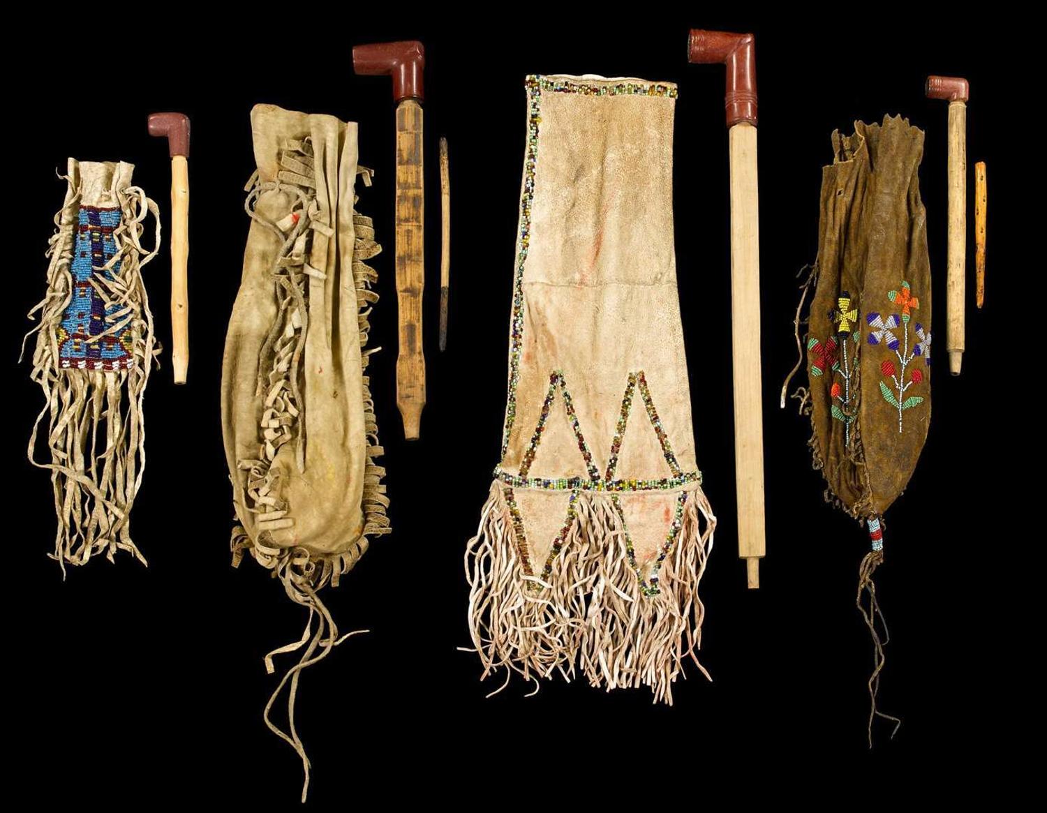 Beaded and fringed hide pipe bag and pipe belonging to Blue Thunder, survivor of The Battle of the Little Bighorn last half 19th century