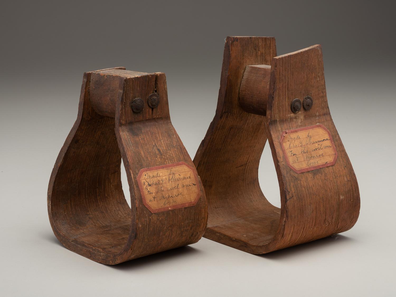 [CIVIL WAR]. Two Civil War stirrups. Made by Charles G. Sherman, Monroe, CT.