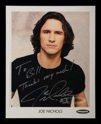 (Celebrity) A group of 10 autographed photos of musical stars, comprising: