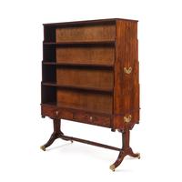 A Regency Style Figured Rosewood Double-Sided Bookcase on Stand