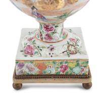 A Chinese Export Parcel Gilt Decorated Famille Rose Porcelain Pistol-Handled Urn
