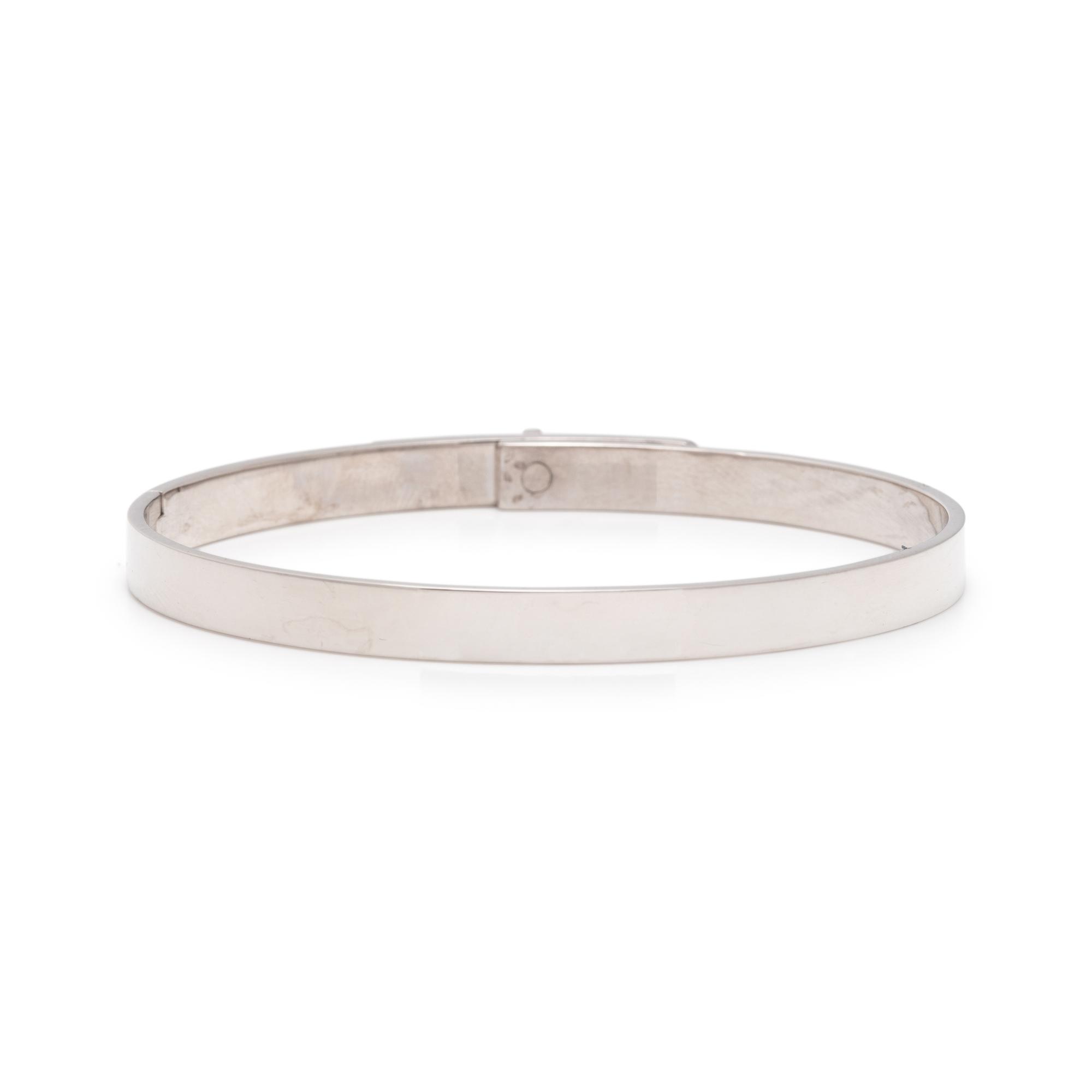 HERMÈS, WHITE GOLD AND DIAMOND 'KELLY' BANGLE BRACELET