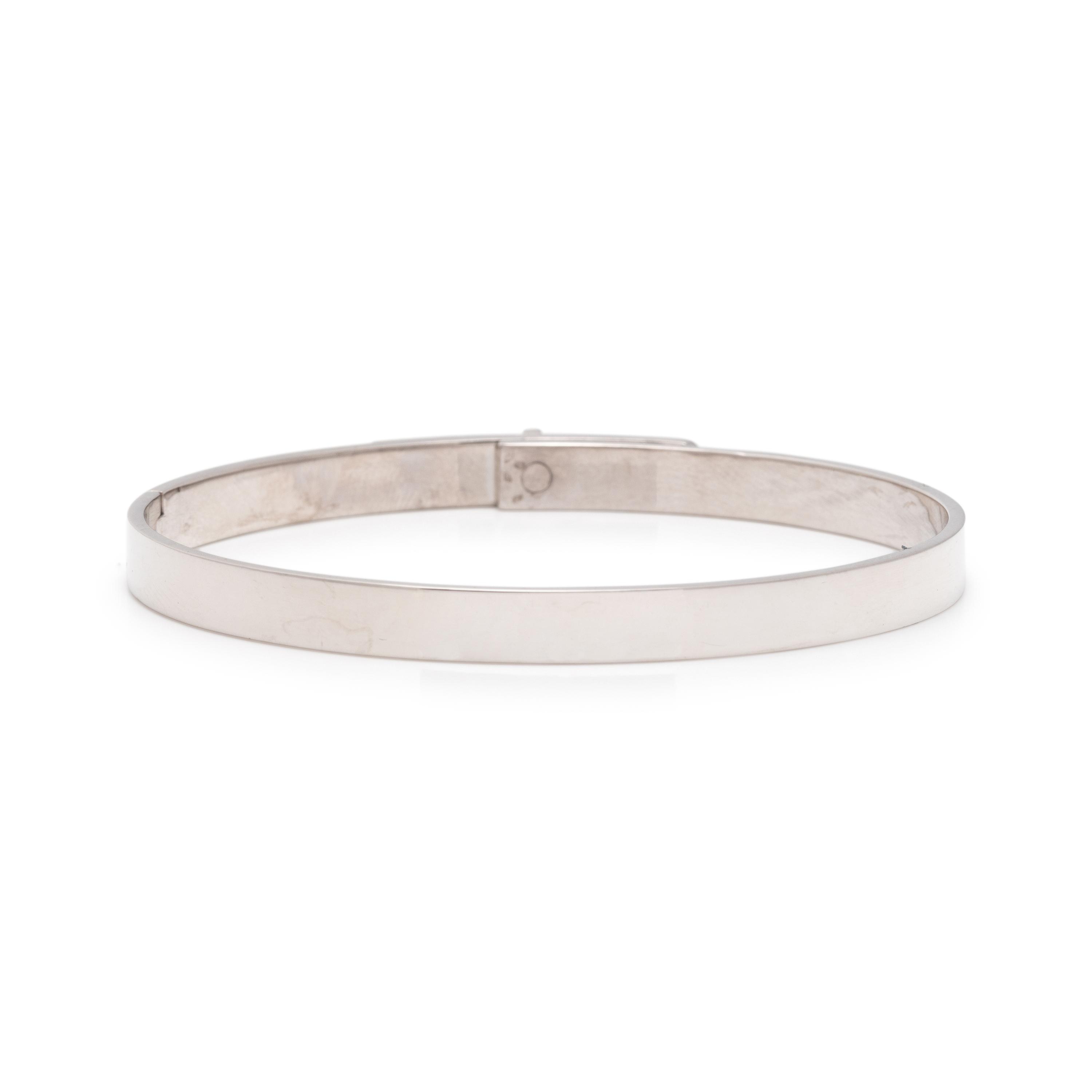 HERMÈS, WHITE GOLD AND DIAMOND 'KELLY' BANGLE BRACELET
