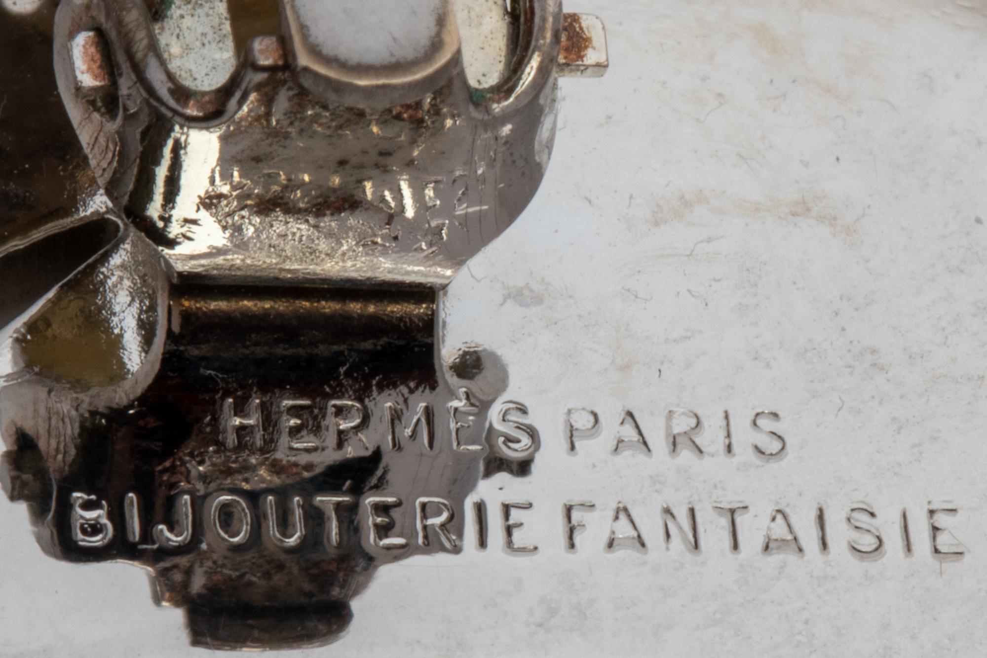 Two Hermès Items: Pair of Ear Clips and Ring