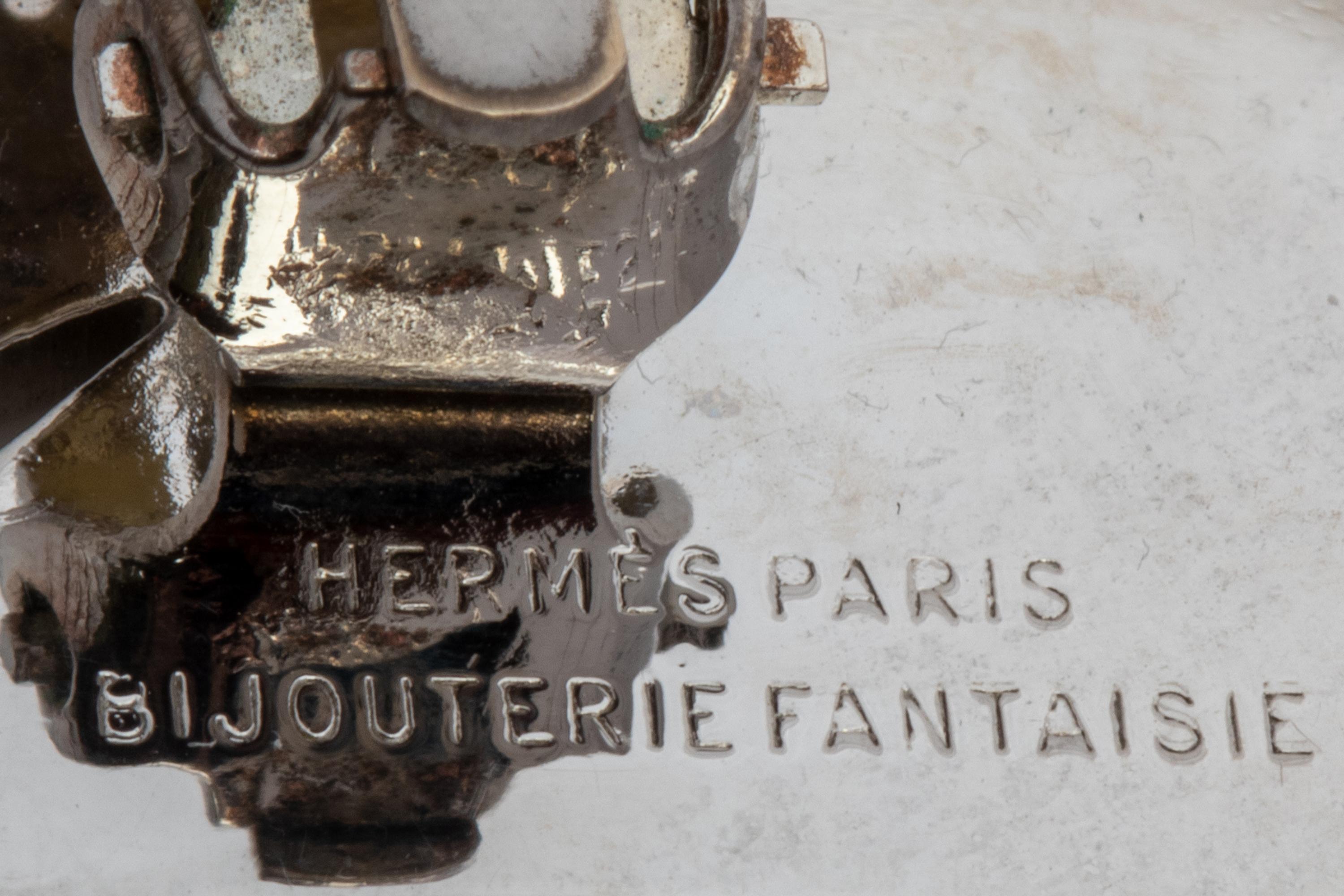 Two Hermès Items: Pair of Ear Clips and Ring