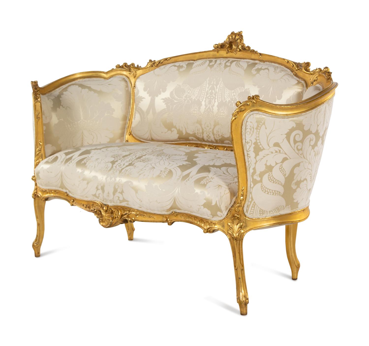 An Assembled Louis XV Style Giltwood Parlor Suite