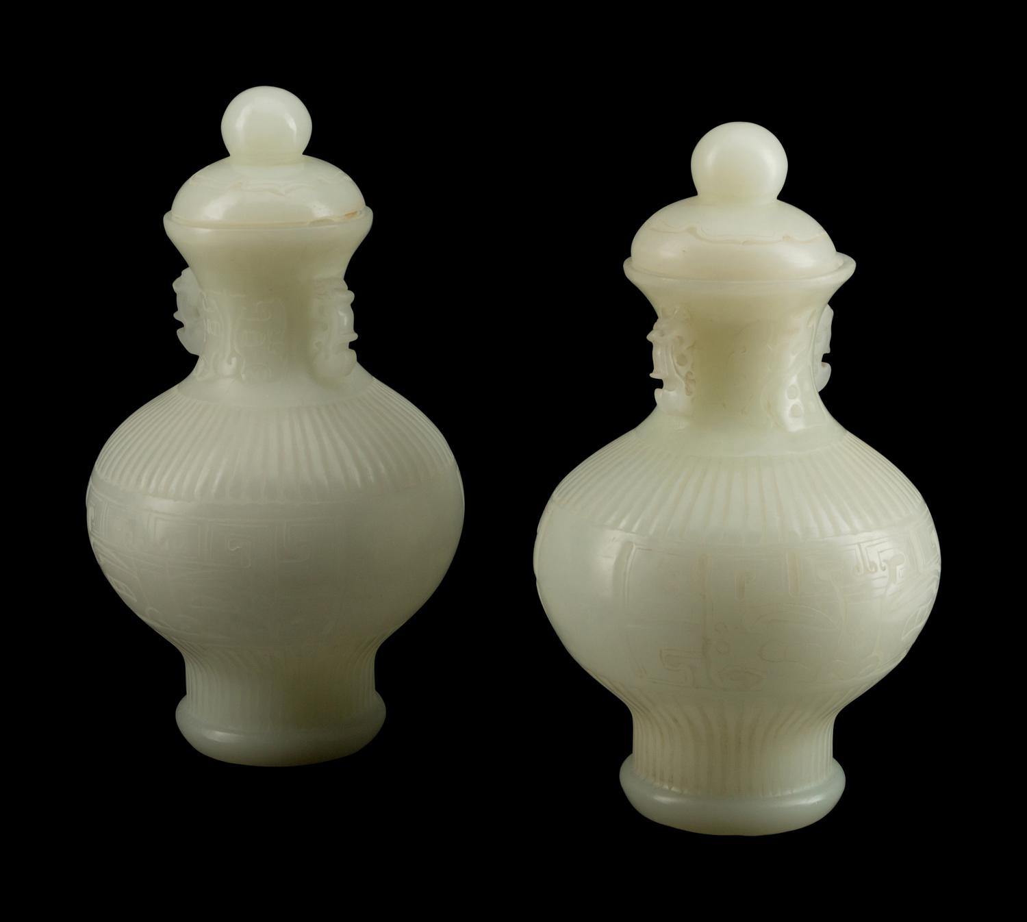 A Pair of Chinese White Peking Glass Covered Vases
