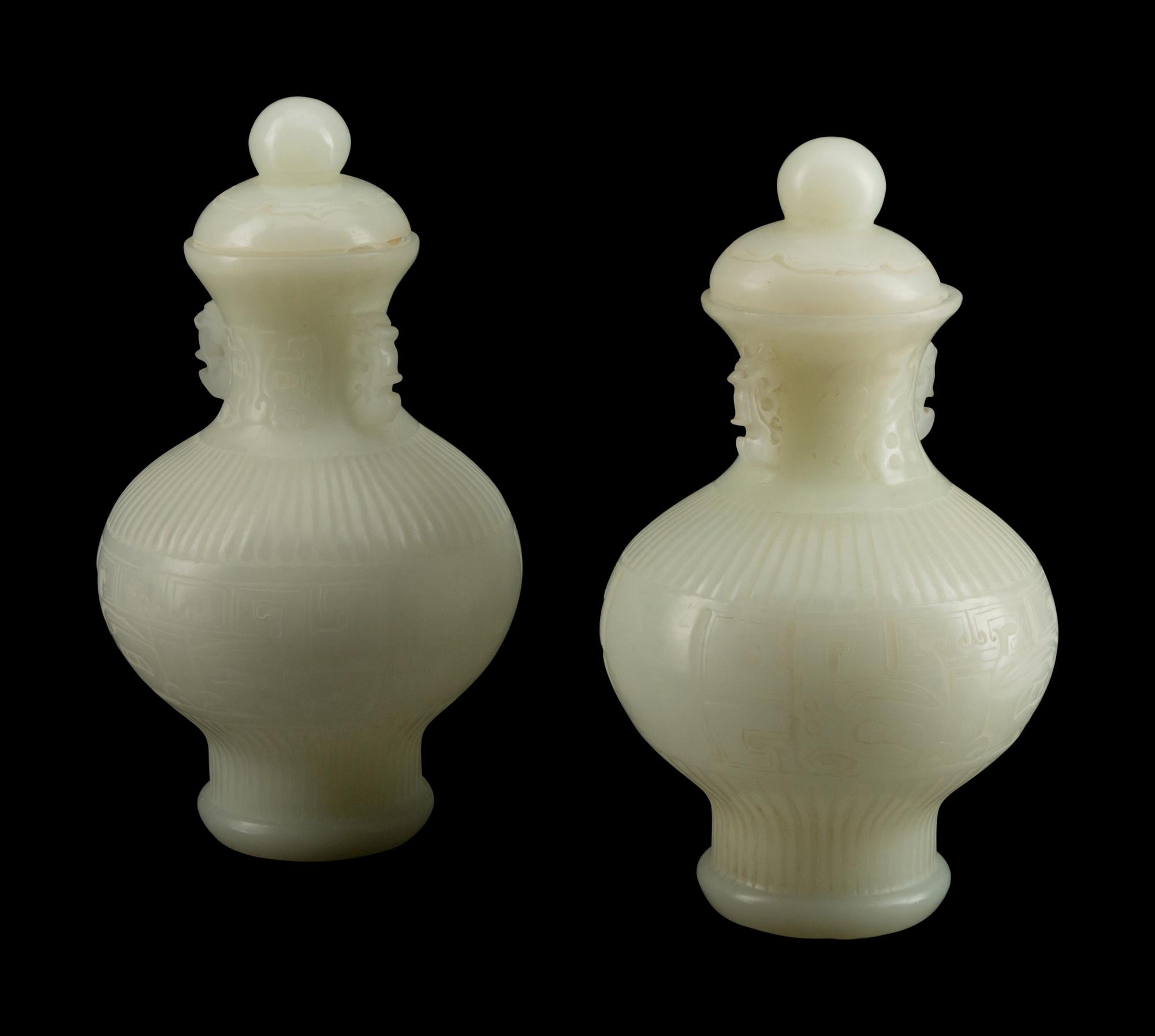 A Pair of Chinese White Peking Glass Covered Vases
