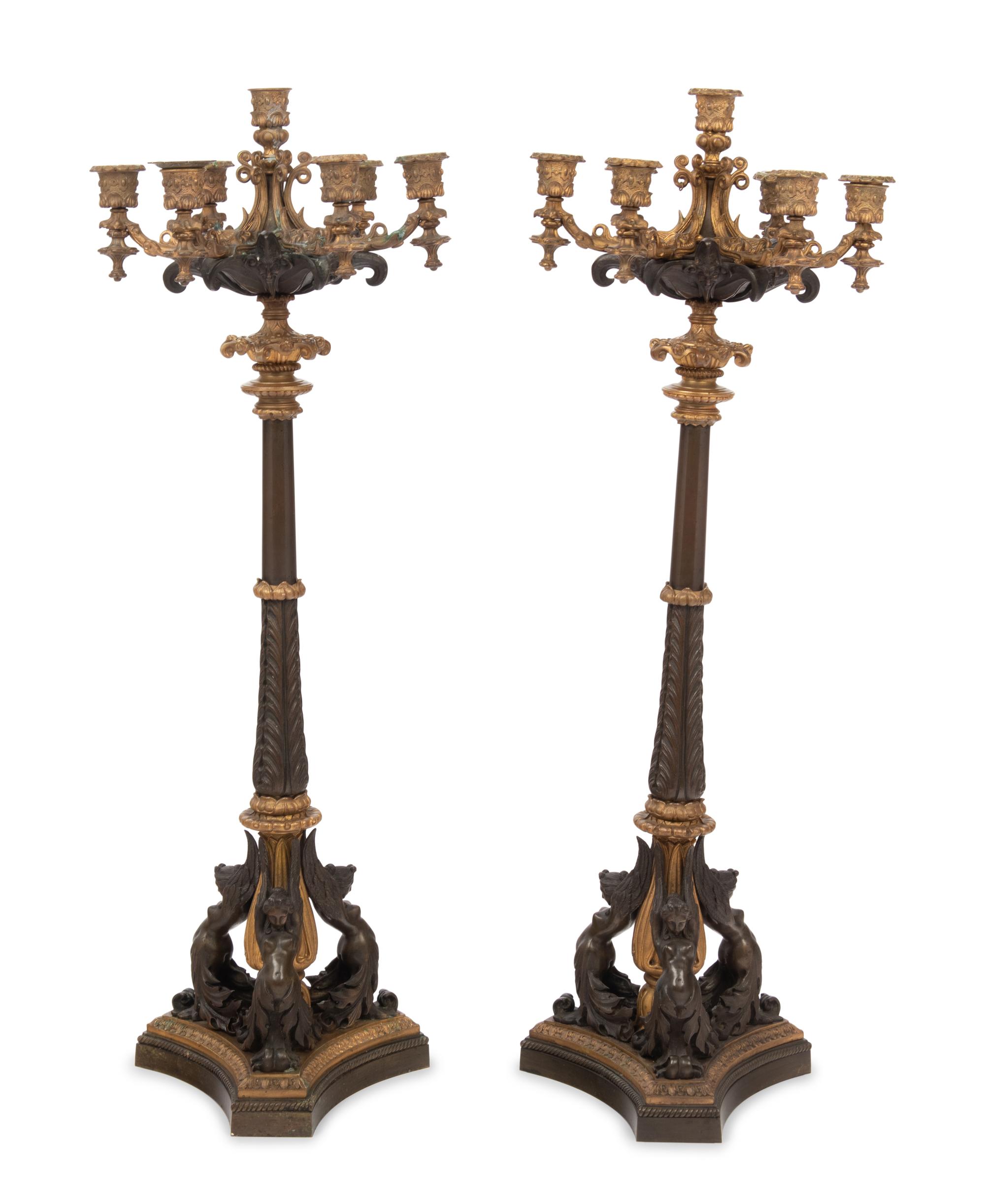 A Pair of French Neoclassical Gilt and Patinated Bronze Seven-Light Candelabra