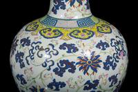 A Pair of Large Chinese Famille Rose Porcelain 'Bajixiang' Vases, Tianqiuping , Late 19th-Early 20th Century 清晚期 粉彩八吉祥大天球瓶一對