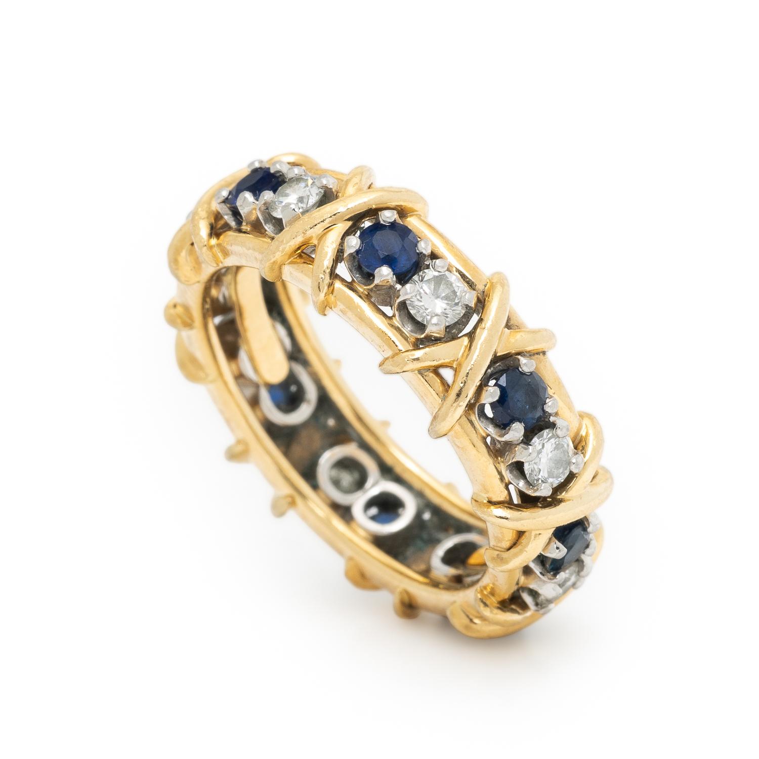 TIFFANY & CO., SCHLUMBERGER, SAPPHIRE AND DIAMOND 'SIXTEEN STONE' RING