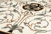 An Italian Parcel-Gilt and Ebonized Pietra Dura-Top Center Table