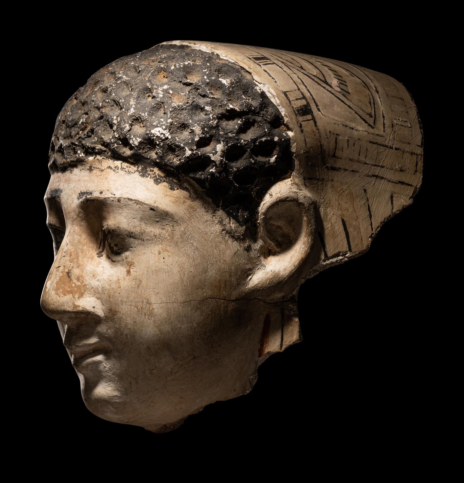 An Egyptian Cartonnage Mummy Mask