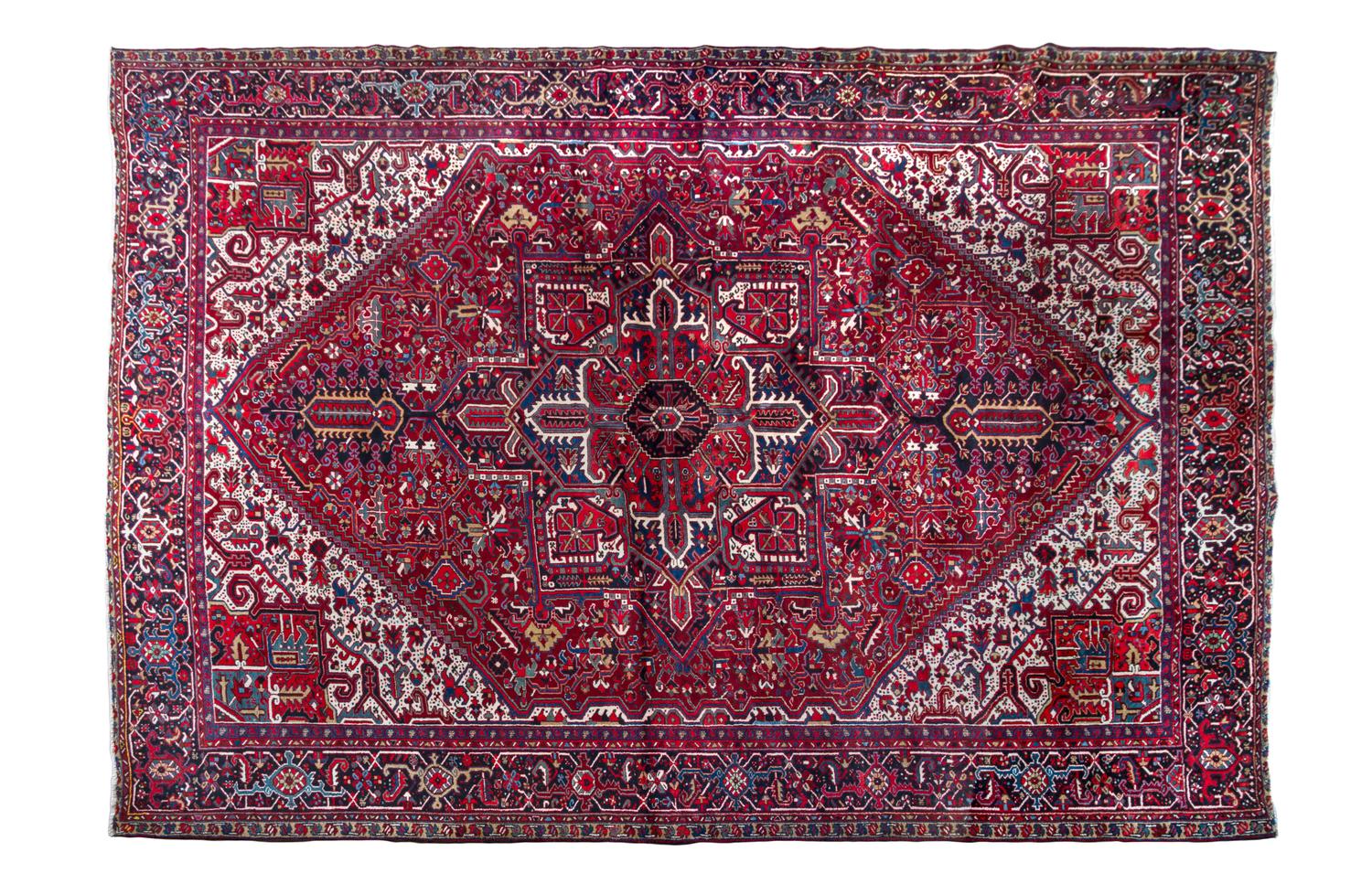 A Heriz Wool Rug 15 feet 4 inches x 11 feet 10 inches.