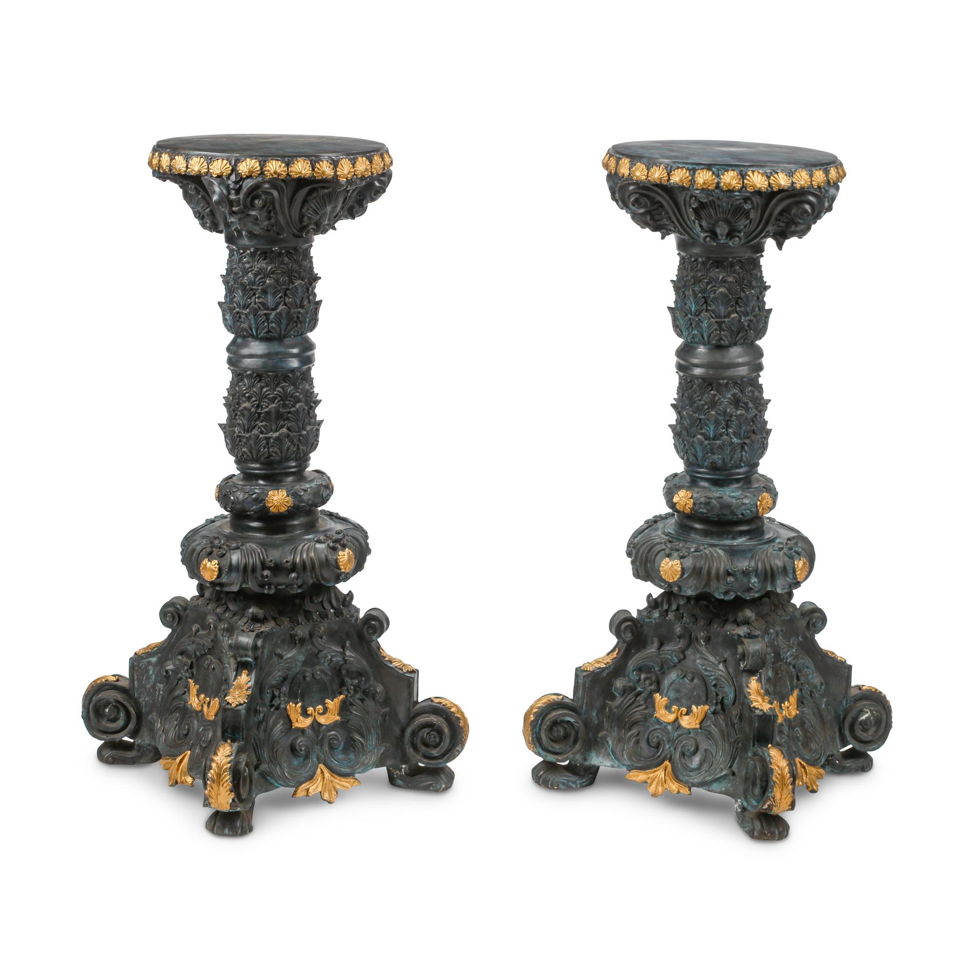 A Pair of Régence Style Patinated and Parcel Gilt Bronze Pedestals