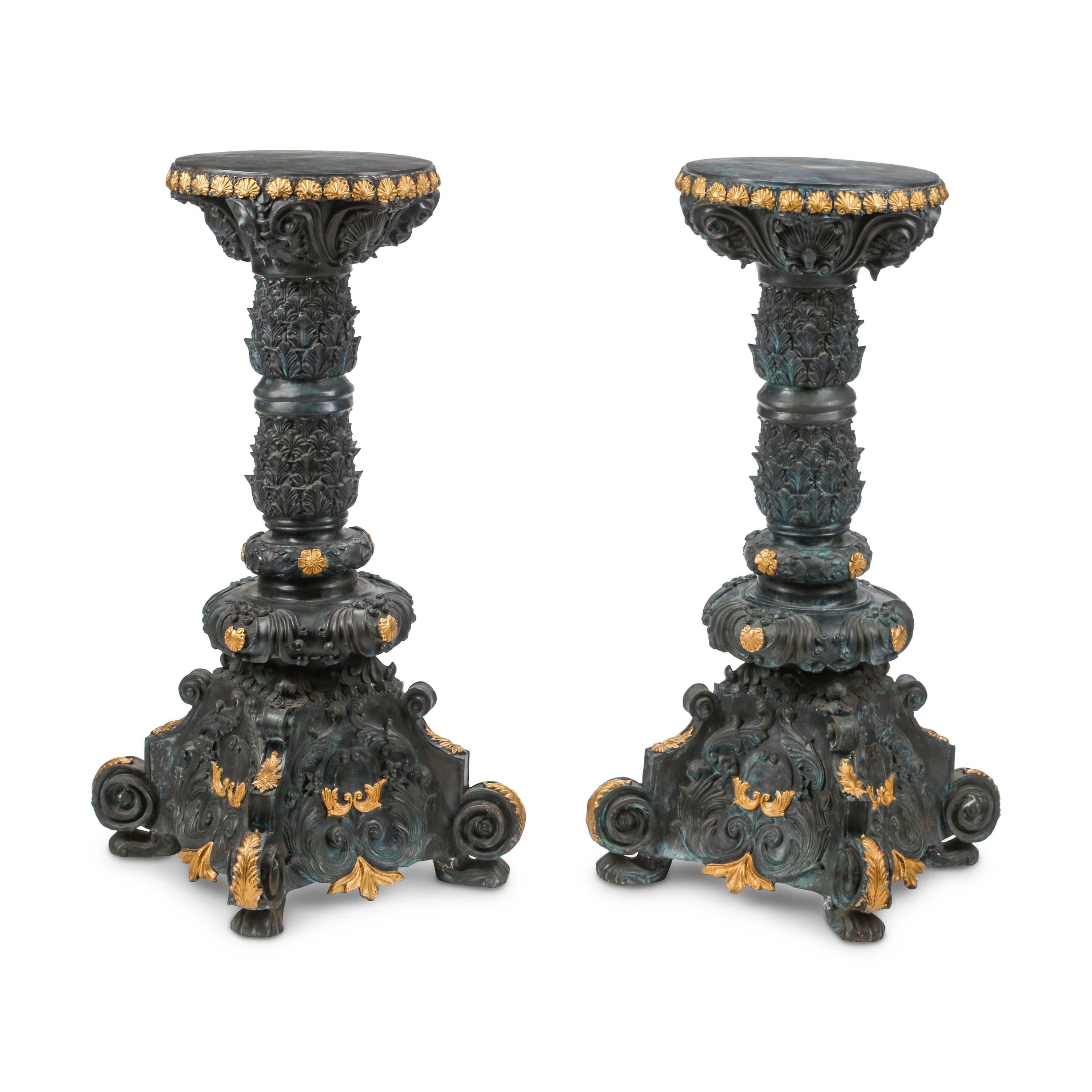 A Pair of Régence Style Patinated and Parcel Gilt Bronze Pedestals
