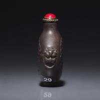 A Chinese Carved Duan Stone Snuff Bottle, Circa 1750-1820 1750-1820年 端石刻龍紋鼻烟壺