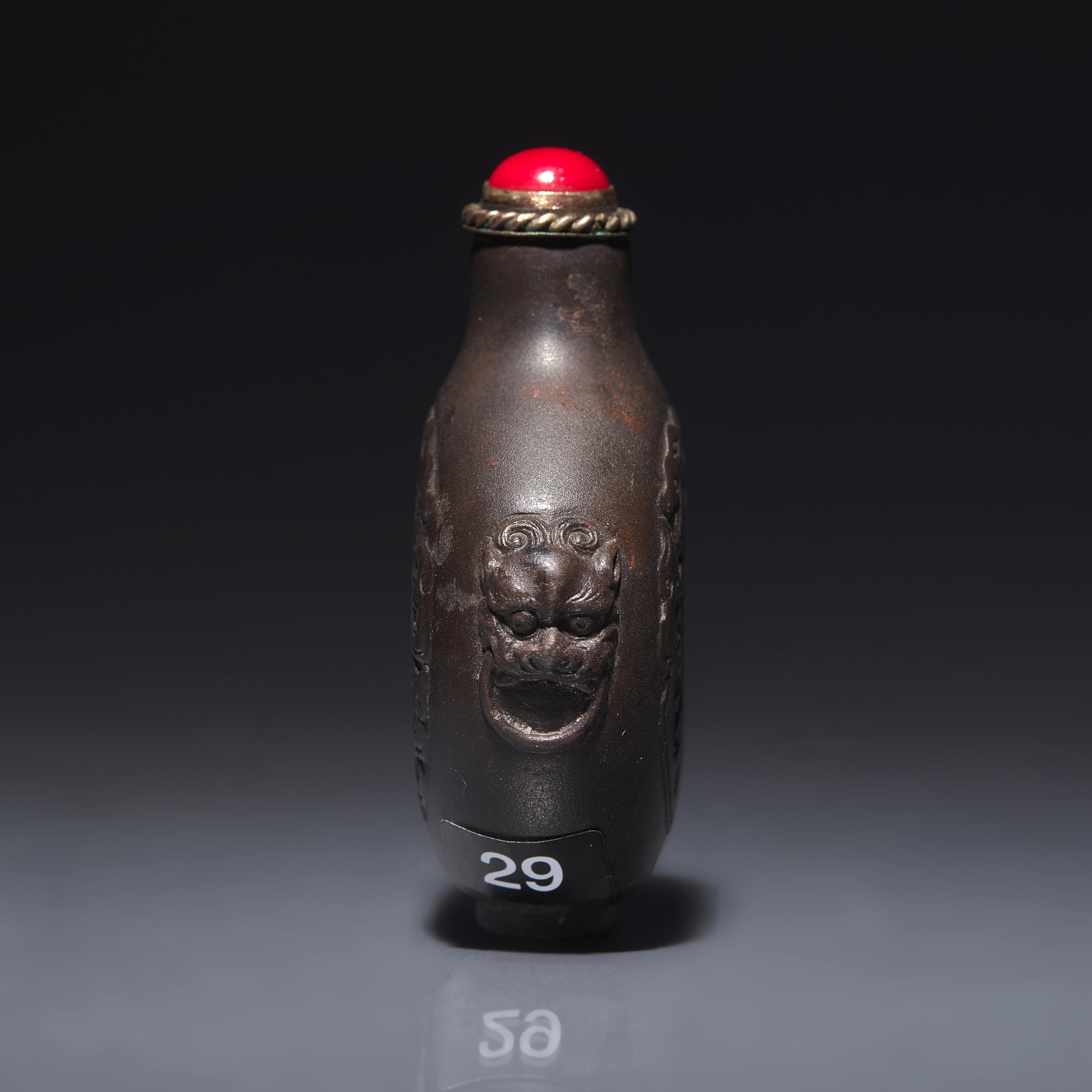 A Chinese Carved Duan Stone Snuff Bottle, Circa 1750-1820 1750-1820年 端石刻龍紋鼻烟壺