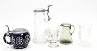 A Group of Four German Drinking Articles Height of tallest 9 1/4 inches.