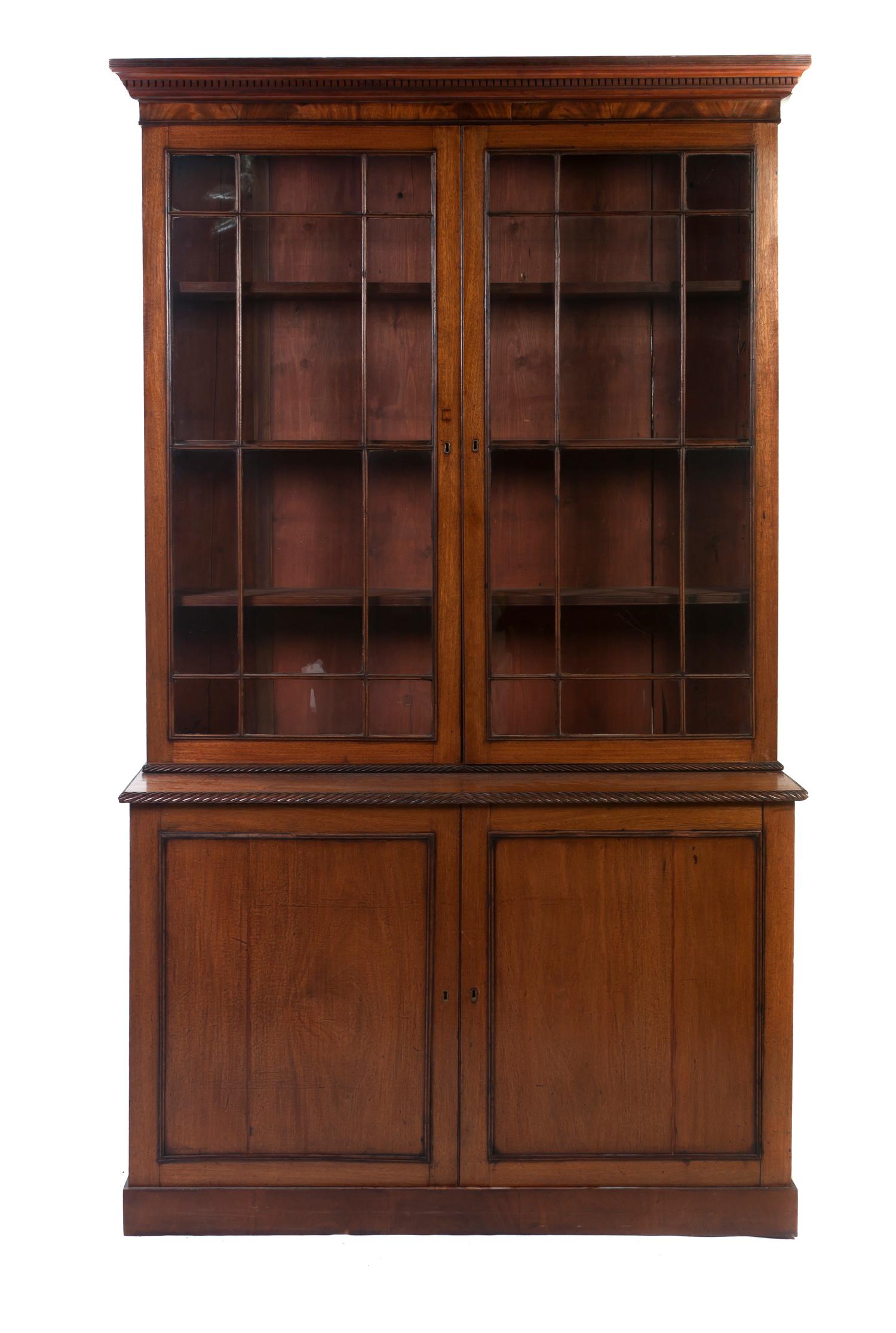 A George III Mahogany Stepback Cupboard, Height 94 x width 54 x depth 20 1/4 inches.