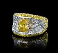 A 19 Karat Gold, Fancy Color Diamond and Diamond Ring, 11.00 dwts.