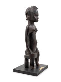 A Senufo Style Carved Wood Figure