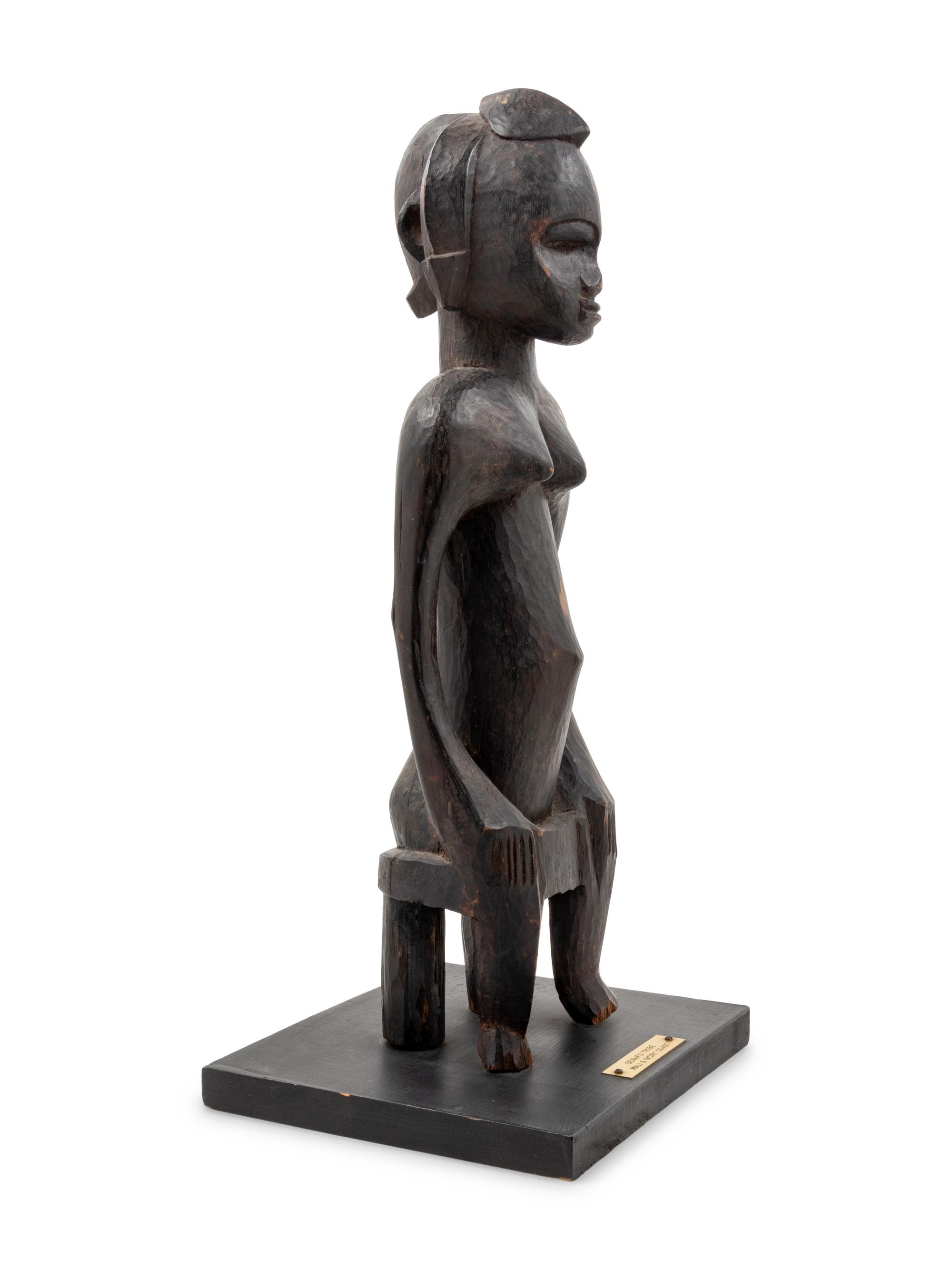 A Senufo Style Carved Wood Figure