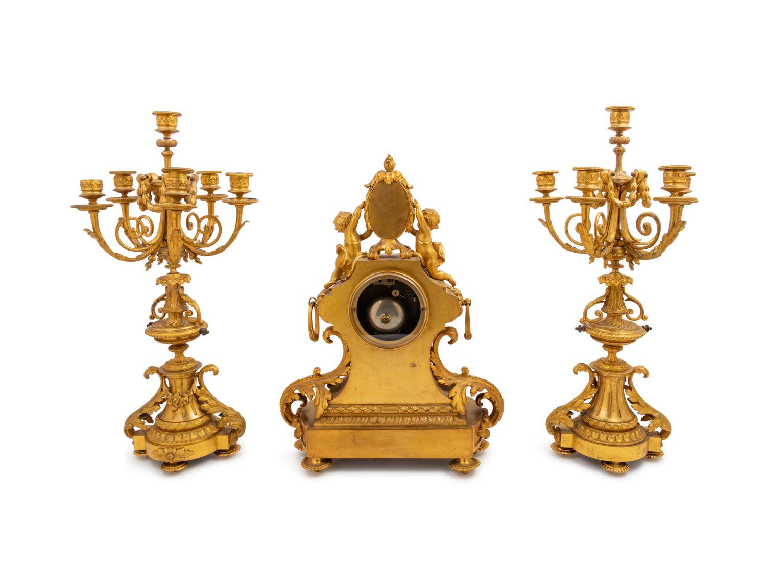 A Louis XVI Style Gilt Bronze Clock Garniture