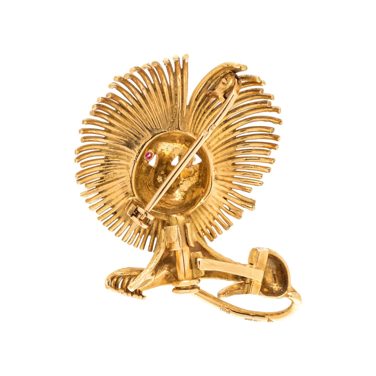 FRENCH, YELLOW GOLD AND RUBY LION BROOCH