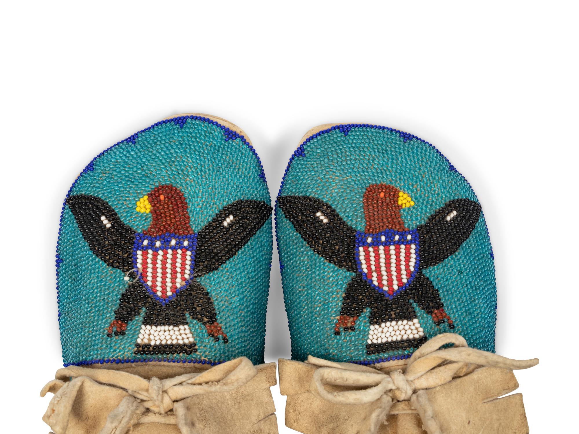A Pair of Plateau Beaded Hide Moccasins