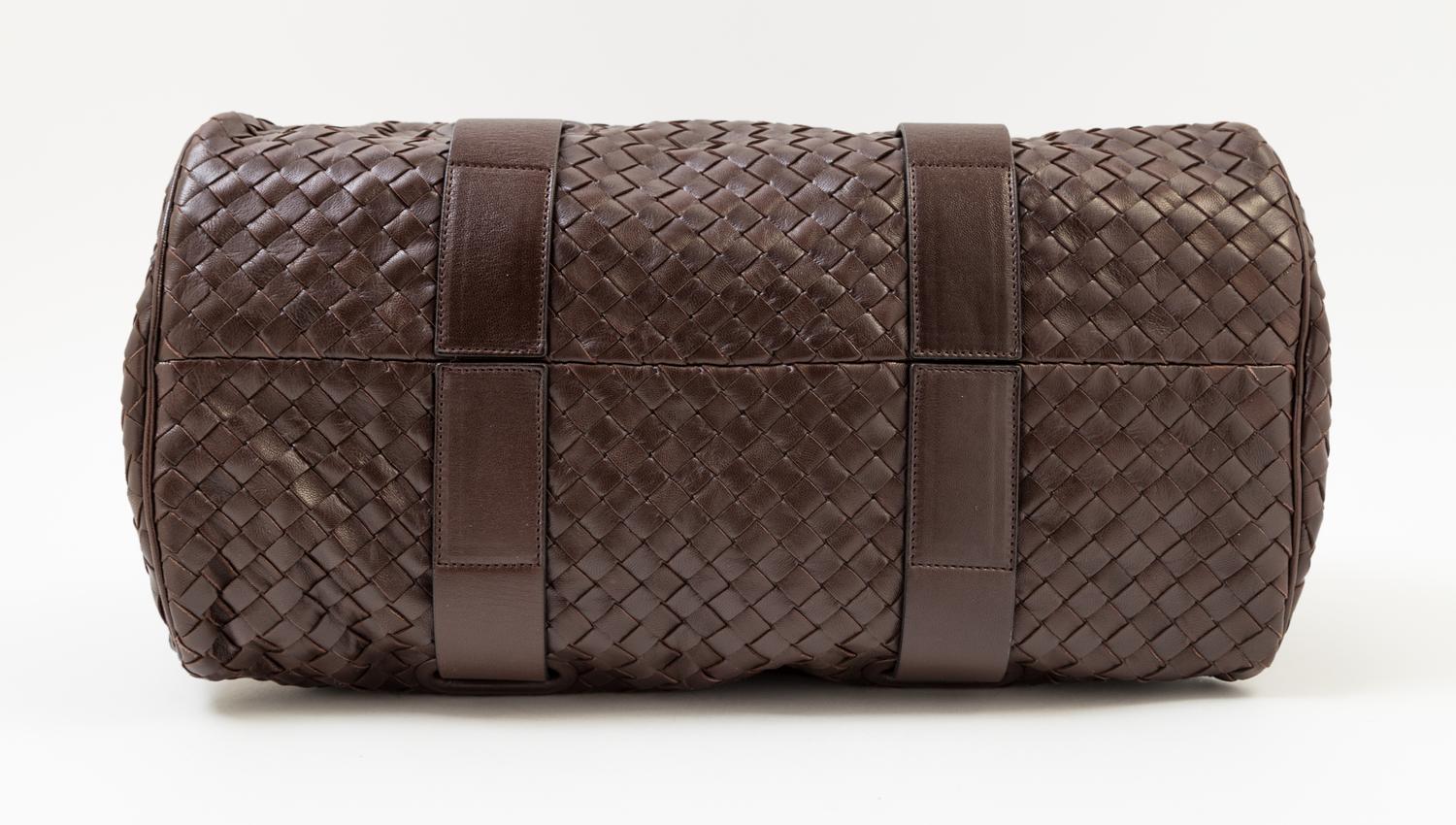 A Bottega Veneta Chocolate Intrecciato Small Duffle Bag, 14" x 9" x 7"; Handle Drop: 6".