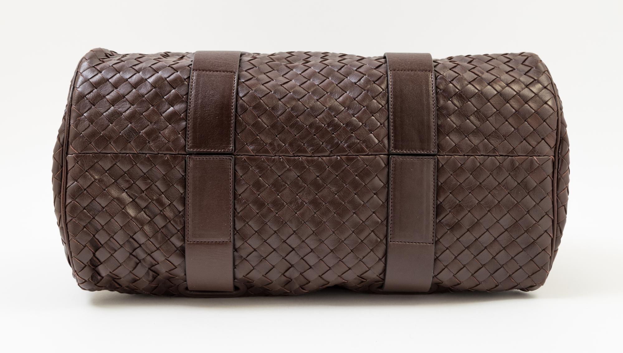 A Bottega Veneta Chocolate Intrecciato Small Duffle Bag, 14" x 9" x 7"; Handle Drop: 6".
