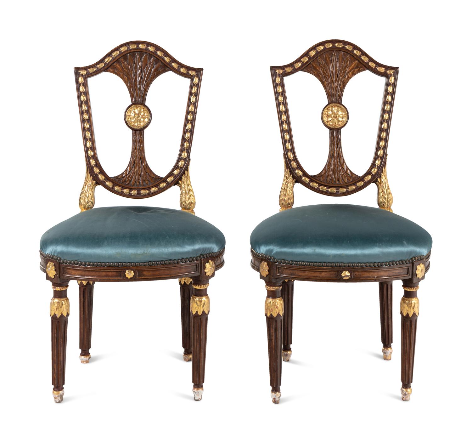 A Pair of Russian Neoclassical Parcel-Gilt Mahogany Side Chairs