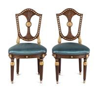 A Pair of Russian Neoclassical Parcel-Gilt Mahogany Side Chairs