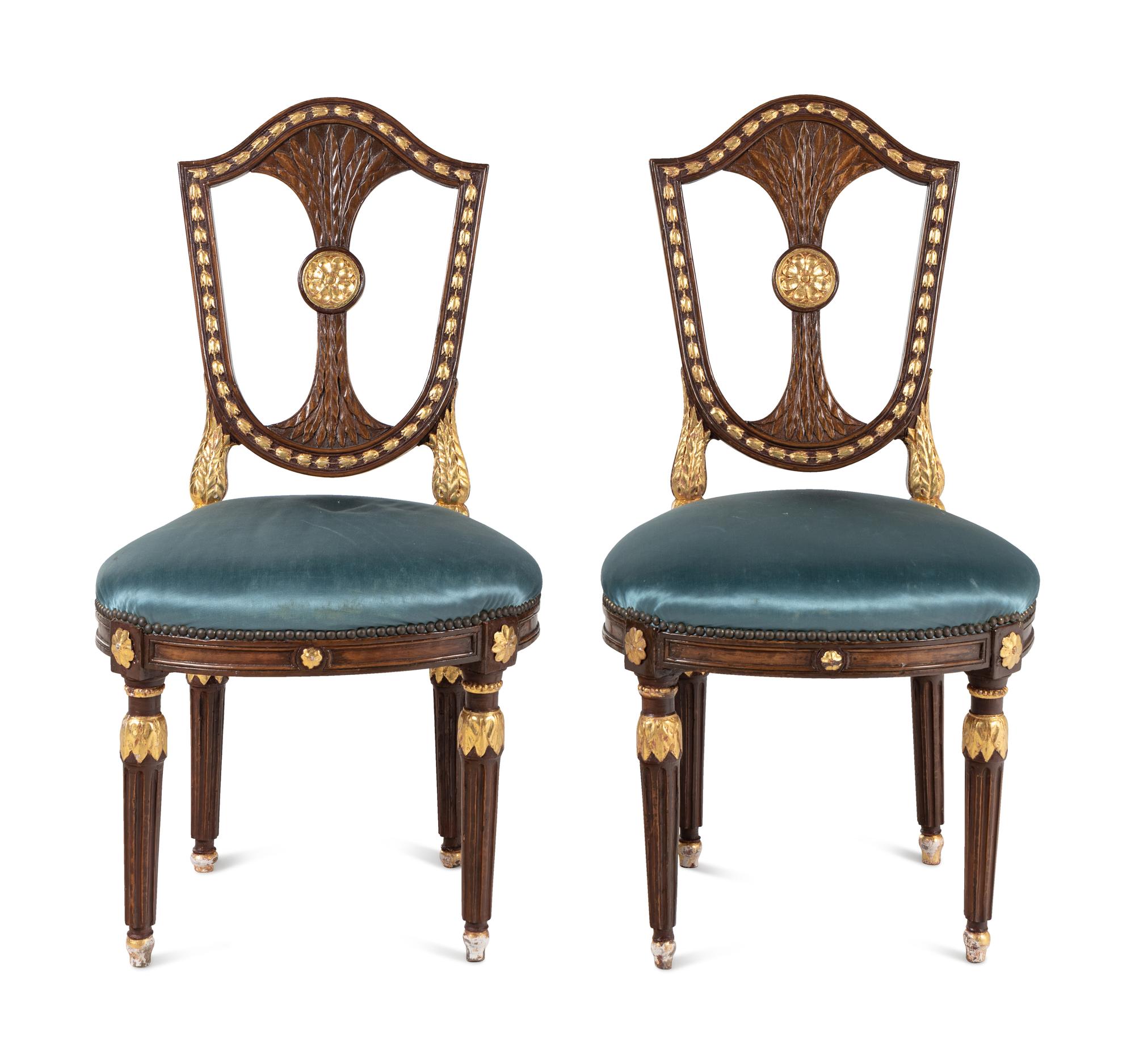 A Pair of Russian Neoclassical Parcel-Gilt Mahogany Side Chairs
