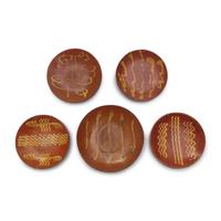 A Group of Five Slip-Decorated Redware Plates